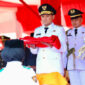 Wagub Aceh Fadhlullah Pimpin Penurunan Bendera di Blang Padang.(Foto.Ist)